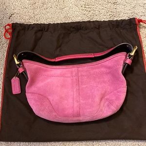 Coach hot pink suede bag with duster.